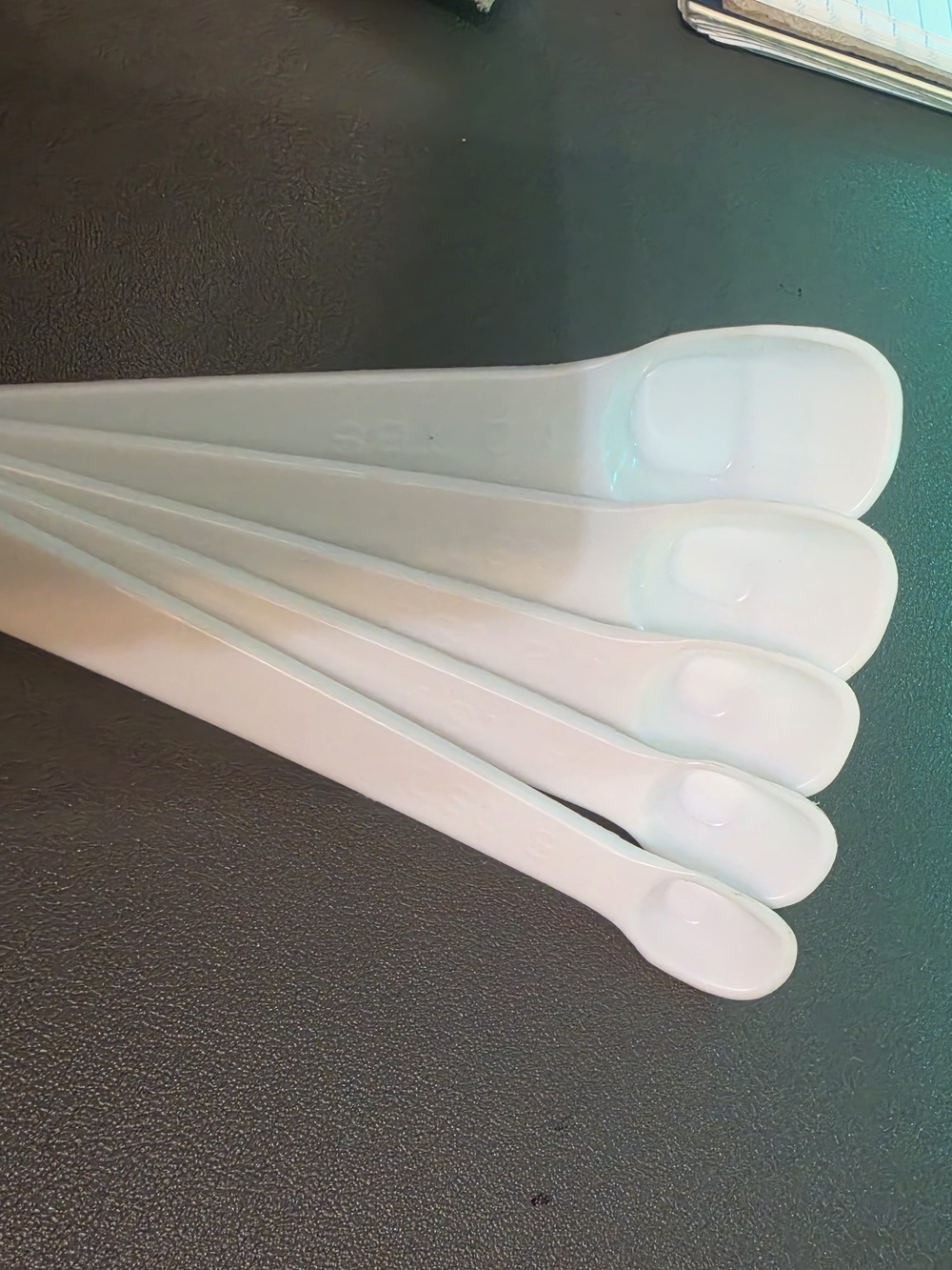 White Plastic Measuring Spoons - Multipack for Home Parties